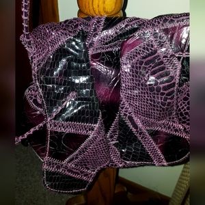 Mini faux leather patchwork shoulder bag.